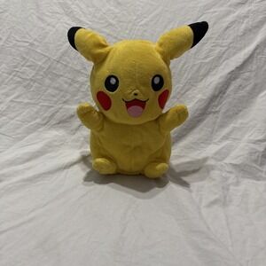 TOMY 2014 Pokemon Pikachu 11 Inch Plush Toy with Secret Compartment